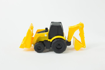 Yellow Tractor Loader Toy on white background isolation image..
