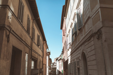 Tuscany architectural buildings on street in Siena