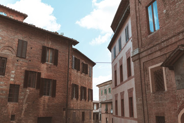 Tuscany architectural buildings on street in Siena