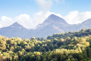 Fototapeta premium Photo of mountainous landscape with green trees