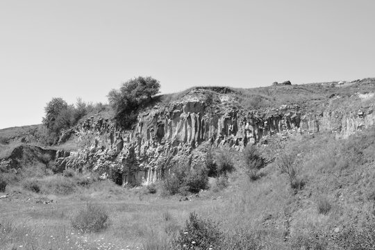Basalt columns rocks in Racos, Transylvania. They are volcanic rock outcrops in the form of columnar basalt located in Racos, Romania
