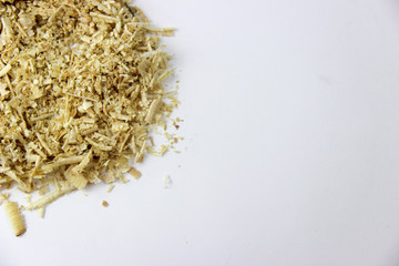 Pile of sawdust on a white background