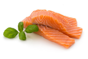 Fresh salmon fillet with basil on the white background.