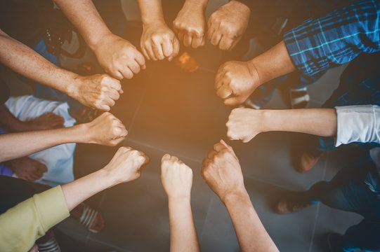 Teamwork unity Arms consolidation