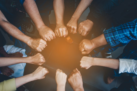 Teamwork unity Arms consolidation