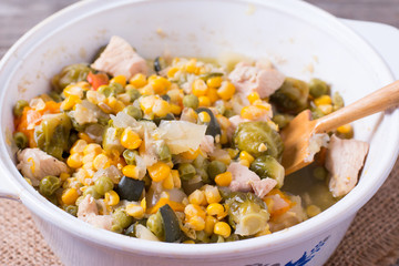 Pan with frozen vegetable mix for frying. Studio Photo
