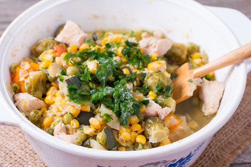 Pan with frozen vegetable mix for frying. Studio Photo