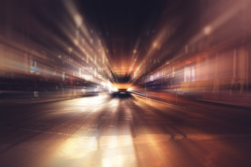 Fototapeta na wymiar Blurry Illumination and night lights, car traffic motion blur the speed moving