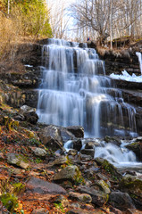 Fototapeta na wymiar Waterfall in mountain. Small river on old mountain, Serbia and her waterfall Tupavica