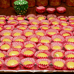 Cooking cupcakes in the form. Dough in paper form for cupcakes. Preparation of homemade muffins for Easter. Selective focus.