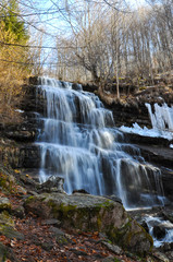 Obraz premium Waterfall in mountain. Small river on old mountain, Serbia and her waterfall Tupavica