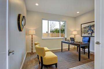 Modern home office design with yellow and blue accents