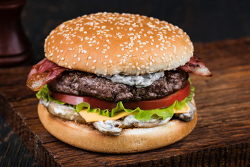 Burger on a wooden board