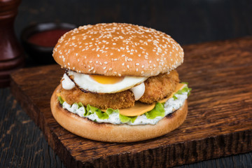 Burger on a wooden board