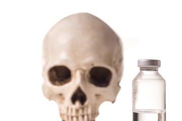 Obraz premium Medical vials and skull