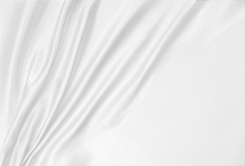 Smooth elegant white silk or satin luxury cloth texture as wedding background. Luxurious background design