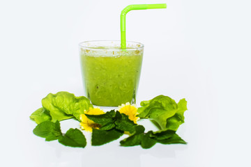 Healthy avocado smoothie in a glass isolated on white background