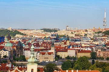 .Panoramic view On the Charles Bridge, the embankment of the Vltava River and the historic center of Prague. Czech Republic.