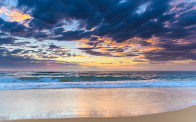 Naklejka na ściany i meble Sunrise Seascape at the Beach with Clouds