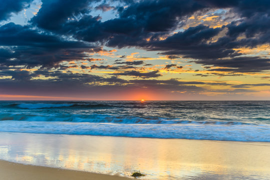 Sunrise Seascape at the Beach with Clouds