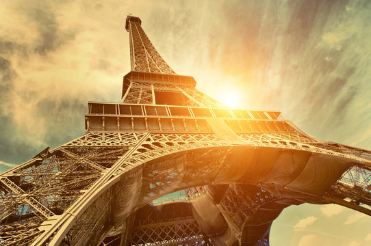Fototapeta The Eiffel tower is one of the most recognizable landmarks in the world under sun light