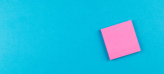 pink post on blue background