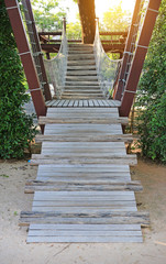 Wooden stairs up the bridge.