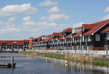 Fototapeta na wymiar Pierhouses in the Reitdiephaven in the city of Groningen. The Netherlands