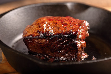 Beef steak on cast iron skillet