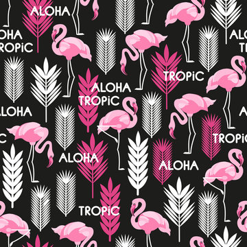 Seamless pattern with birds of pink flamingos and leaves of tropical plants. White, black, pink. Vector illustration.