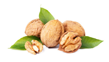 Walnuts with leaves isolated on white background.
