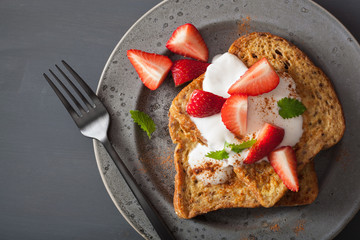 french toasts with yogurt and strawberries for breakfast