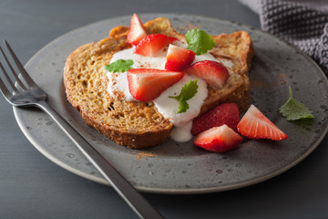 french toasts with yogurt and strawberries for breakfast