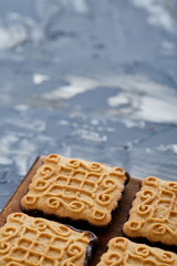 Top view close-up picture of tasty cookies on the cutting board, shallow depth of field, selective focus