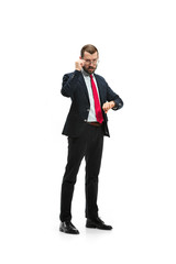 businessman looking at his watch on his hand, watching the time