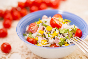 Rice salad with pork steak