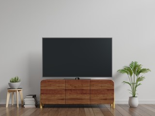 Smart TV on cabinet the white wall in living room,minimal design,3d rendering