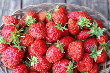 Strawberry on rustic wooden background