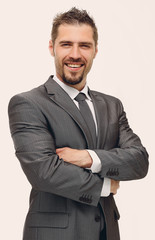 handsome man standing with crossed arms