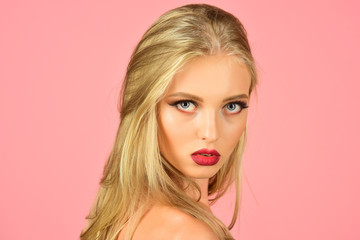 Fototapeta premium Portrait beautiful girl with perfect skin, sexy sensual red lips, glitter makeup. Beauty, spa, skincare, haircare, makeup, cosmetics products. Attractive woman with clean healthy skin, long shiny hair