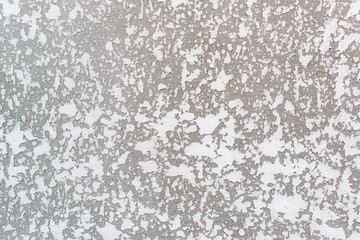 Gray grunge wall texture. Seamless rough surface.