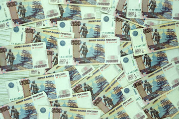 broken glass on the background of a money bill. five hundred rubles. the concept of inflation and the financial crisis.