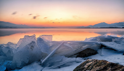 Sunrise and floe at lake
