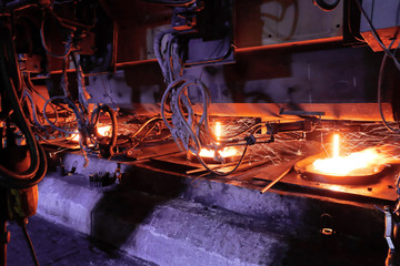 Processing in forming machine after steel-making furnace in smelting steel plant.