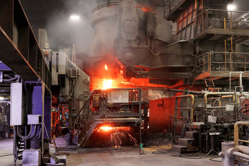 Atmosphere of steel-making furnace in smelting steel plant.