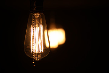 Lamps with tungsten filament. Edison's light bulb. Filament fila