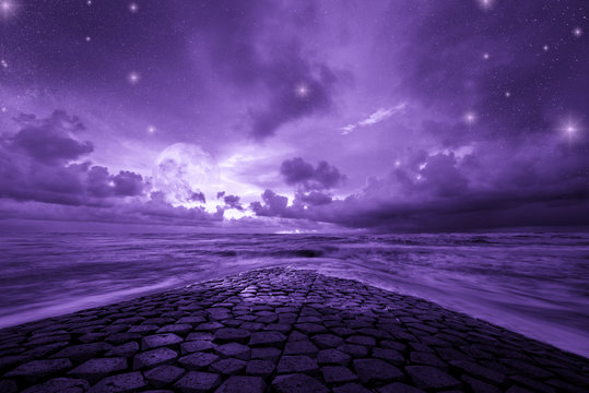 Ultra violet fantasy background, road to the ocean with fantastic night sky, color of the year 2018