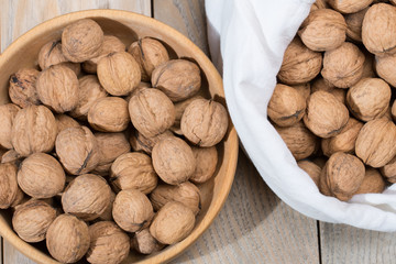 Walnuts on a rustic wooden table