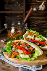 Pita bread sandwiches with meat, beans and vegetables