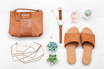 Summer street style. Fashion summer girl clothes set, accessories. Trendy slippers, handbag clutch,  watch. Summer lady. Creative urban overhead summer top view - obrazy, fototapety, plakaty